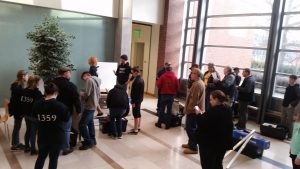 people waiting in a line, of sorts